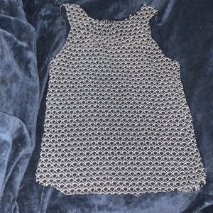 It is a navy blue shirt, from the brand H&M, size 4.